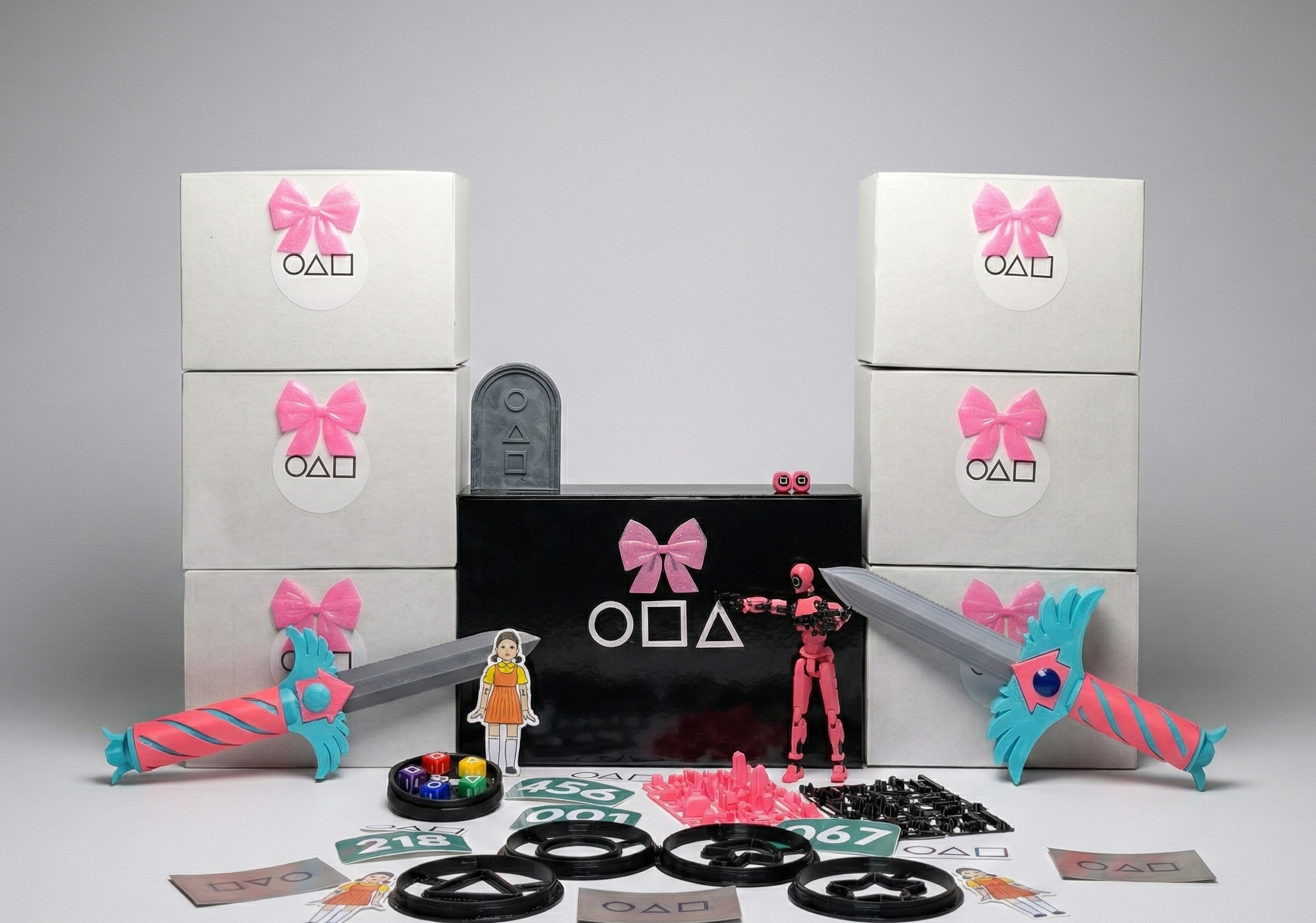 Board game components including figures, cards, and boxes on a gray background